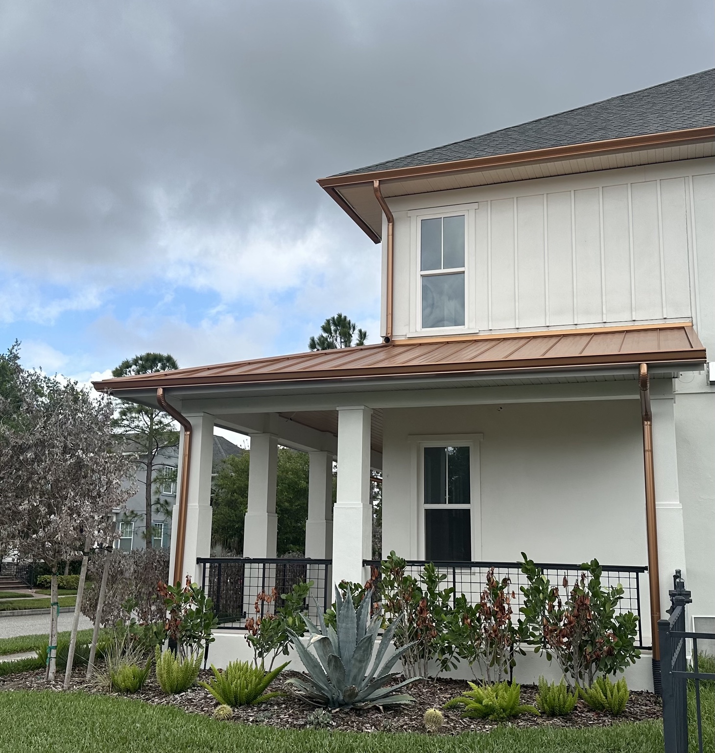 Seamless gutters and downspouts installed on a Central Florida home